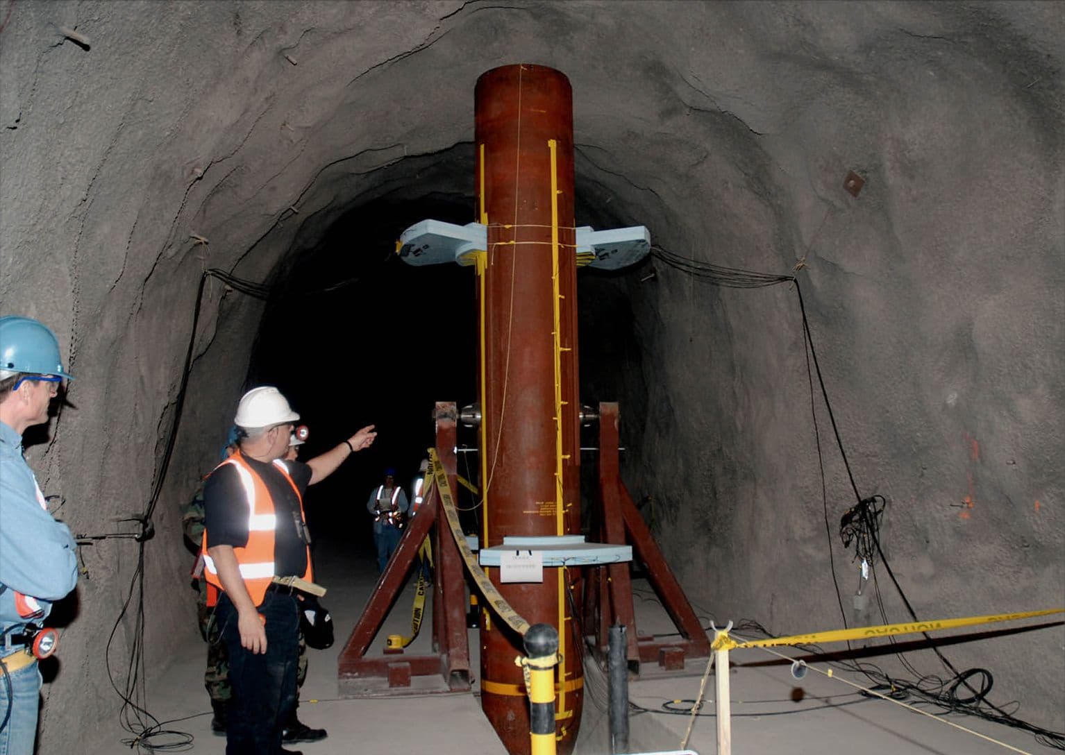 Underground tunnel testing context for how bunker buster bombs work against deep facilities