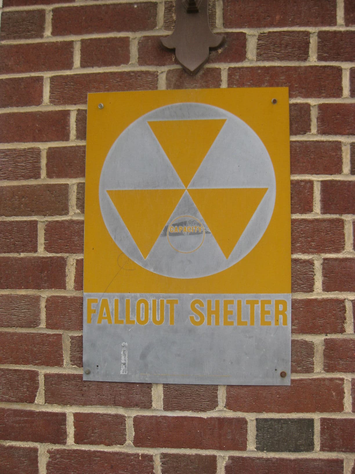 Shelter entrance control point for nuclear fallout decontamination zone management