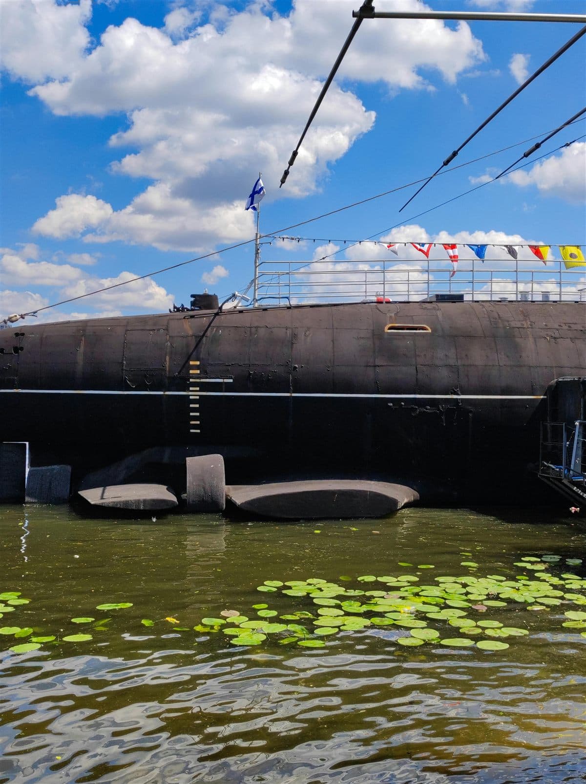Submarine hull at dock representing survivable strategic forces in tactical vs strategic nuclear weapons posture