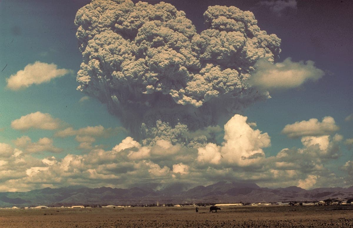 Nuclear winter effects climate analog with Mount Pinatubo ash cloud above farmland